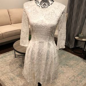 White lace long sleeved mini dress